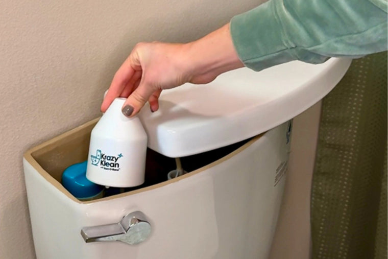Placing the capsule inside the toilet tank